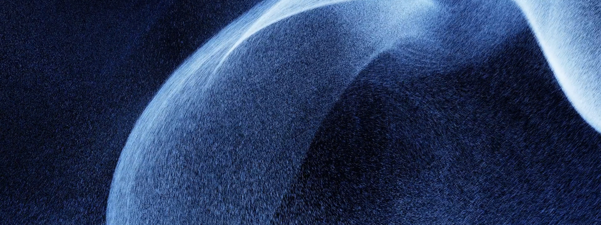 Smooth flow of water visualization on a dark background.