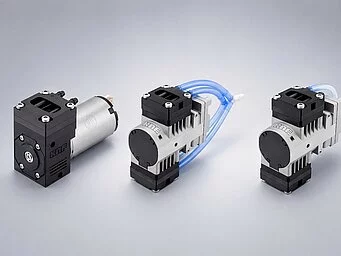 Collage of a diaphragm gas pump NMP 830 with one pump head, two pump heads in parallel, and 2 pump heads in serial connection.