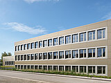 The KNF building in Freiburg-Munzingen in bright sunshine